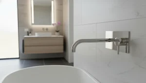 Ava Trend 2 Hole Wall Mounted Bath Mixer W/ Backplate - Polished Stainless Steel detail view - Image 2